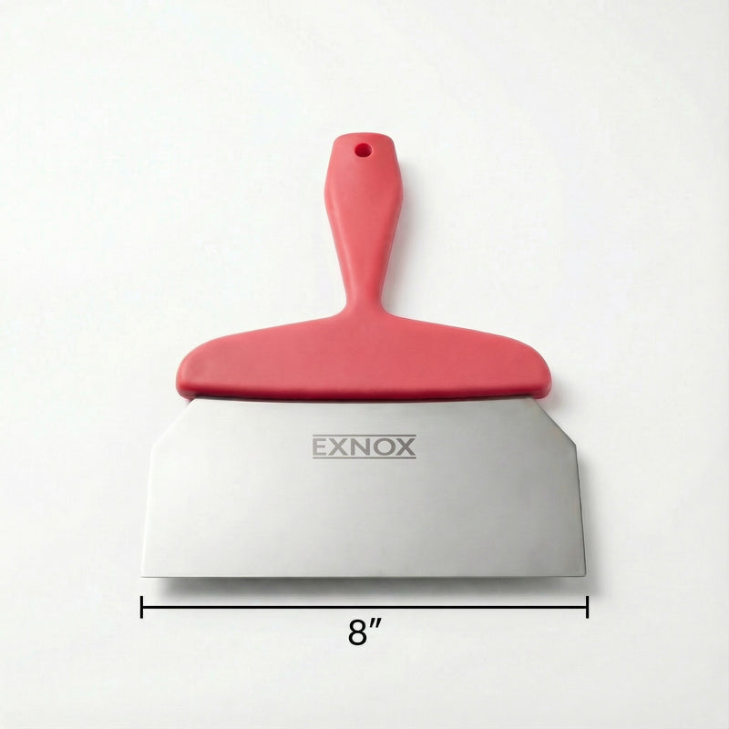 Red spatula with metal blade and 'EXNOX' branding on a white background