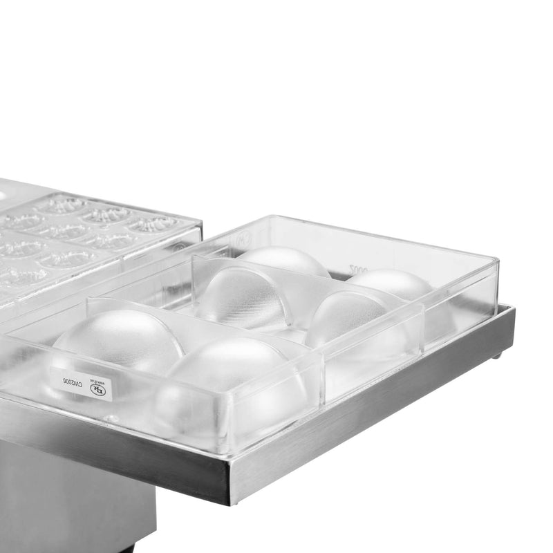 Table vibrante en chocolat avec grille